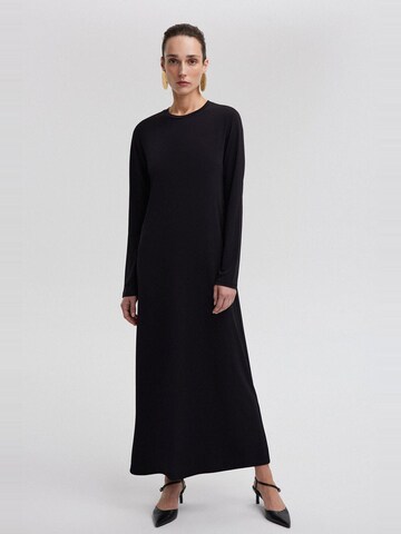 Touche Prive Dress in Black: front