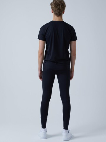 Coupe slim Pantalon de sport 'Long Running Tights' SPORTKIND en noir