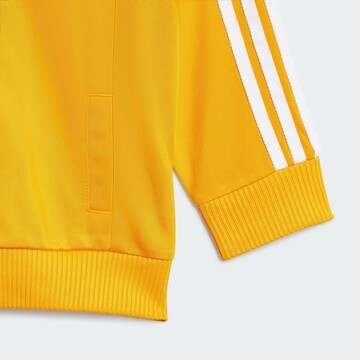 Tuta da jogging 'Adicolor' di ADIDAS ORIGINALS in giallo
