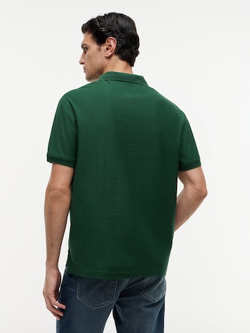 TOMMY HILFIGER Poloshirt in Grün