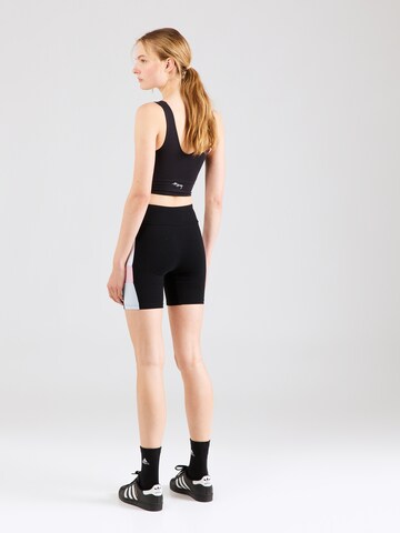 Skinny Pantaloni 'Siennos' de la ELLESSE pe negru