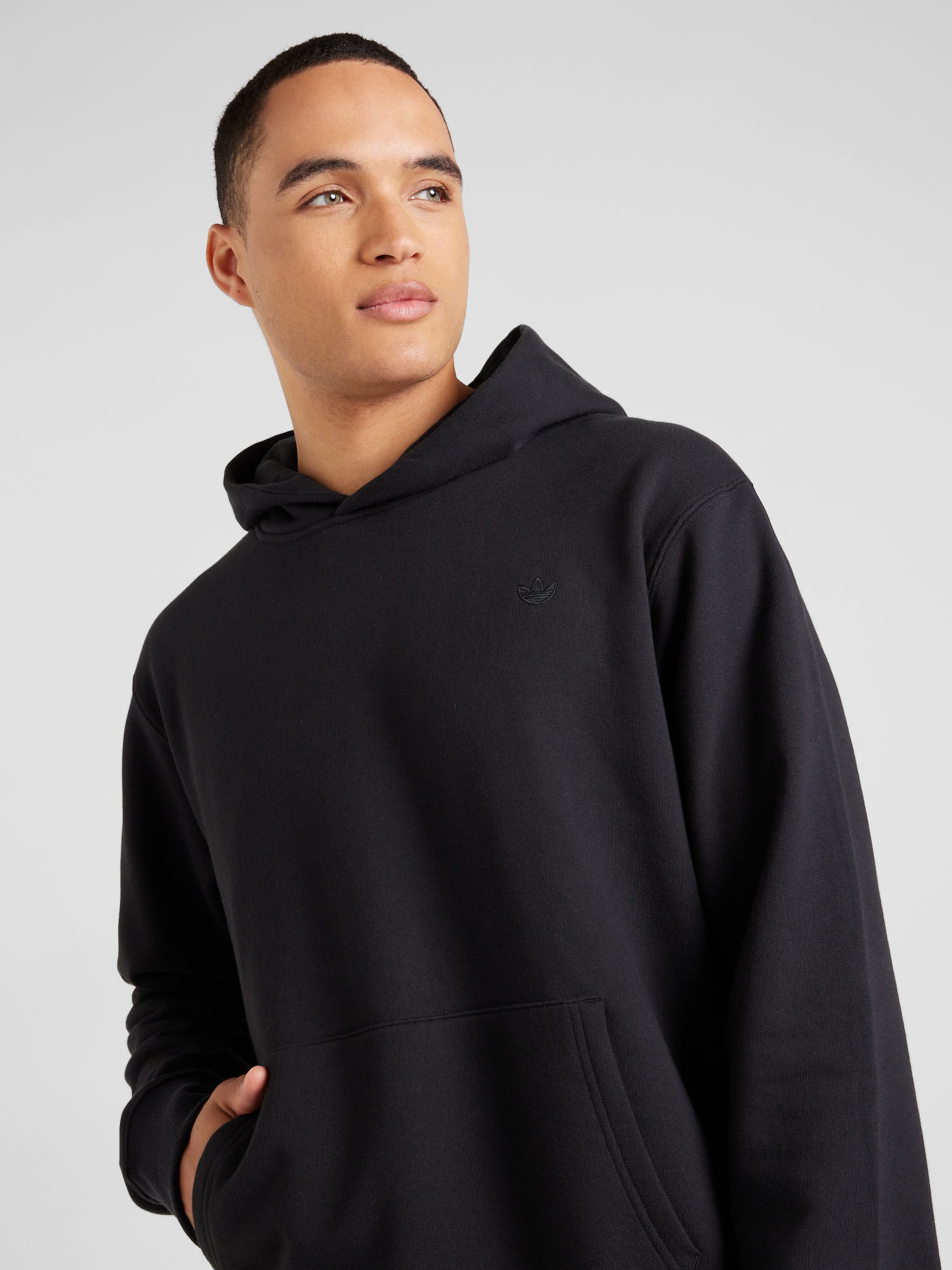 ADIDAS ORIGINALS Sweatshirt Premium Essentials in Schwarz ABOUT YOU