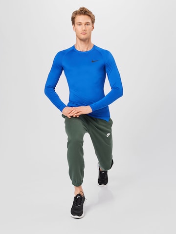 mėlyna NIKE Standartinis modelis Sportiniai apatiniai marškinėliai