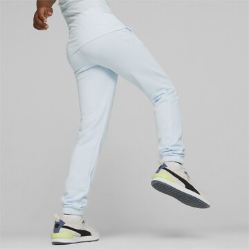 PUMA Regular Sportbroek ' MOTION' in Blauw