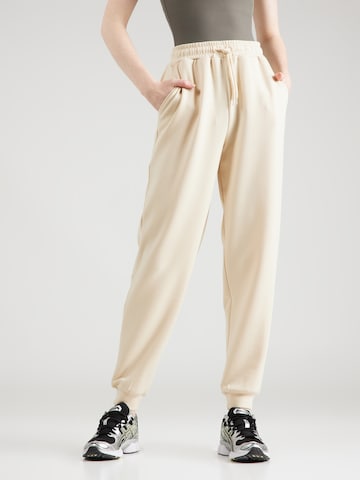 Tapered Pantaloni sportivi 'LOUNGE' di ONLY PLAY in beige: frontale