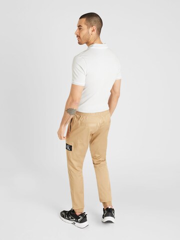 Effilé Pantalon chino Calvin Klein Jeans en beige