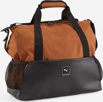 PUMA Sports Bag in Brown: front