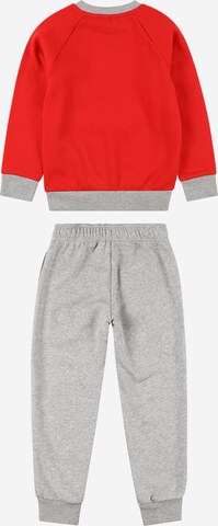 ADIDAS SPORTSWEAR Trainingsanzug 'Essentials Logo Fleece' in Rot