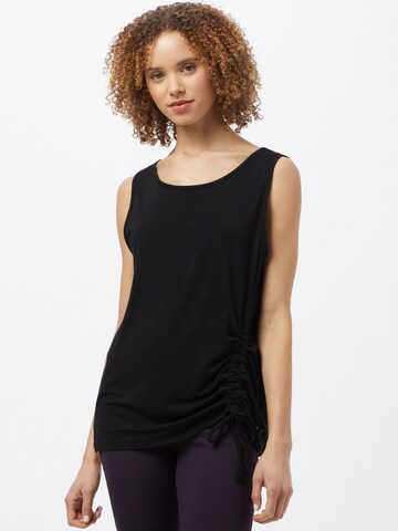 Sport top de la CURARE Yogawear pe negru: față