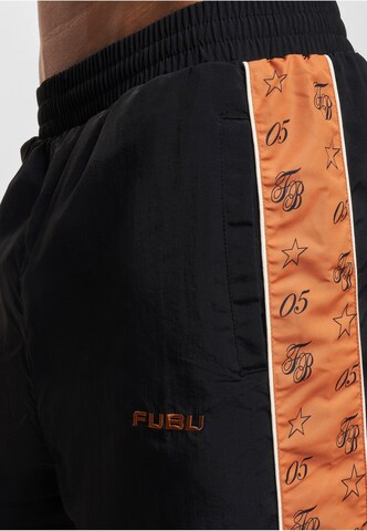 FUBU Zwężany krój Spodnie 'Corporate' w kolorze czarny