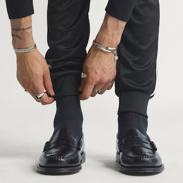 ADIDAS ORIGINALS Дънки Tapered Leg Панталон 'SST' в черно
