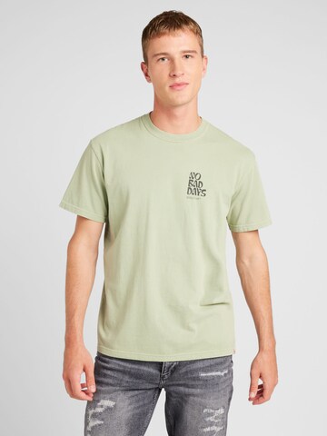 T-Shirt Revolution en vert : devant