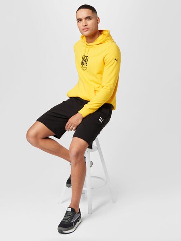 PUMA Sweatshirt in Gelb