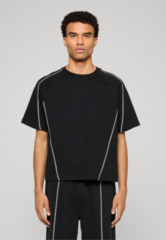 Urban Classics - Camiseta en negro: frente