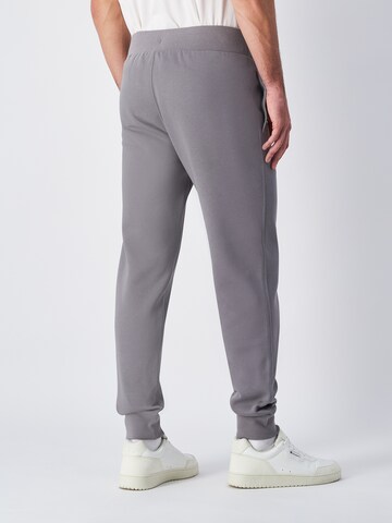 Champion Authentic Athletic Apparel Tapered Pants in Grey