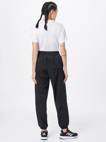 Tapered Pantaloni de la ADIDAS ORIGINALS pe negru