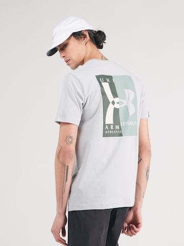 Tricou funcțional de la UNDER ARMOUR pe gri