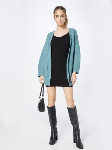 ABOUT YOU Knit cardigan 'Theodora' in Green