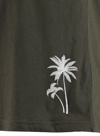 Key Largo T-shirt 'OCEAN DRIVE' i grön