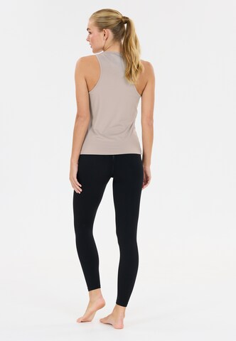 Athlecia Sports top 'Almi V2' in Beige
