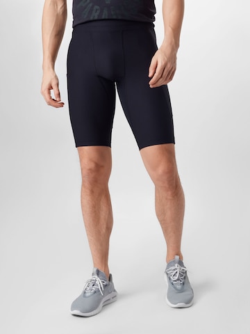 UNDER ARMOUR Skinny Workout Pants 'Project Rock' in Black: front