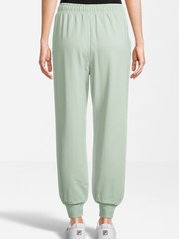 FILA Конический (Tapered) Спортивные штаны в Зеленый