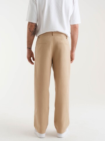 ABOUT YOU x Kevin Trapp Loose fit Trousers 'Jesper' in Beige