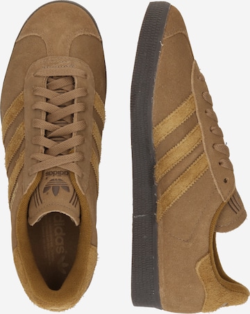 ADIDAS ORIGINALS Platform trainers GAZELLE in Umbra ABOUT YOU