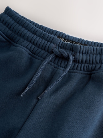 Next Tapered Housut värissä sininen