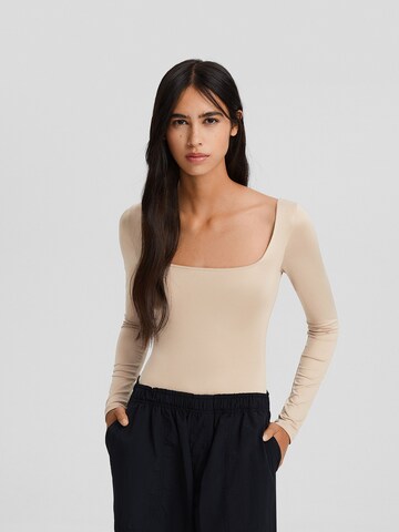 Shirtbody Bershka en beige : devant