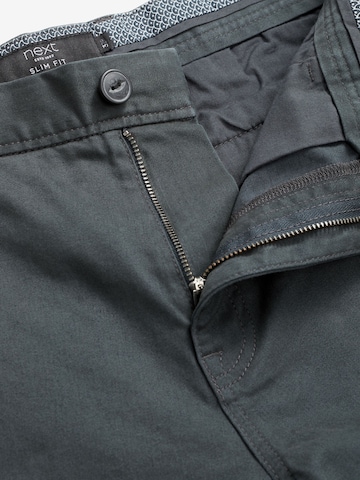 Slimfit Pantaloni chino di Next in grigio