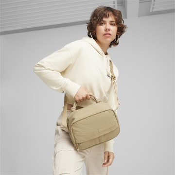 PUMA Crossbody bag in Brown: front