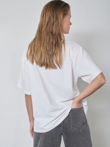 Top ' CocøCC ' di co'couture in bianco