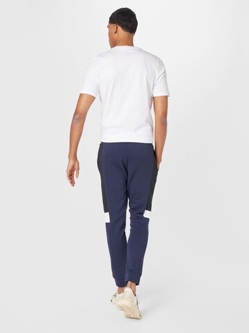 ADIDAS SPORTSWEAR Tapered Workout Pants 'Essentials Colorblock' in Blue