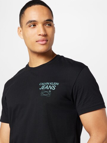 Calvin Klein Jeans Μπλουζάκι 'Future Galaxy' σε μαύρο