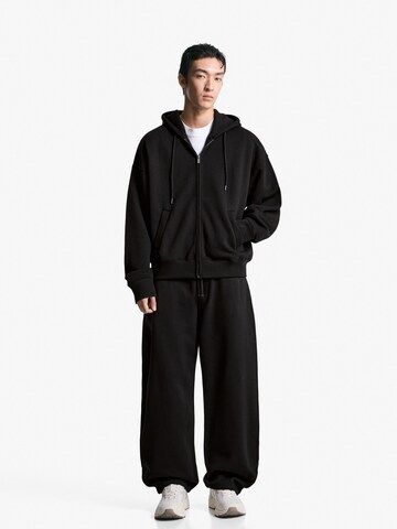 Bershka Zvonové kalhoty Kalhoty – černá