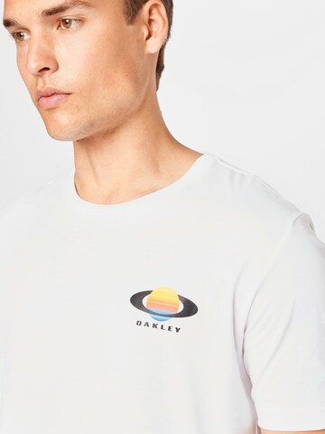 T-Shirt fonctionnel 'PLANET' OAKLEY en blanc