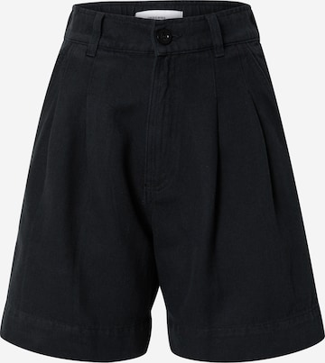 DEDICATED. Loose fit Pleat-Front Pants in Black: front