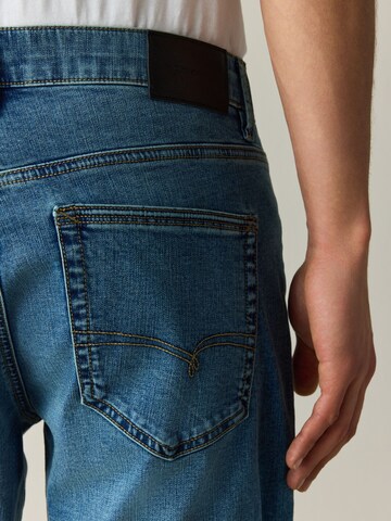 Coupe slim Jean 'Motion Flex' Next en bleu