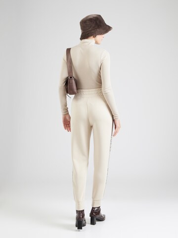 GUESS Конический (Tapered) Штаны 'VICTOIRE' в Бежевый