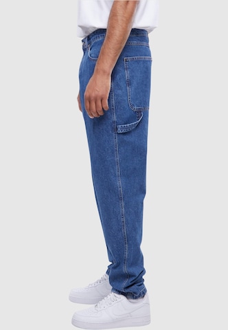 Tapered Jeans di Karl Kani in blu
