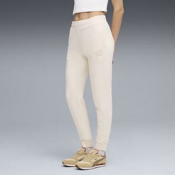 PUMA Tapered Trousers in Beige: front