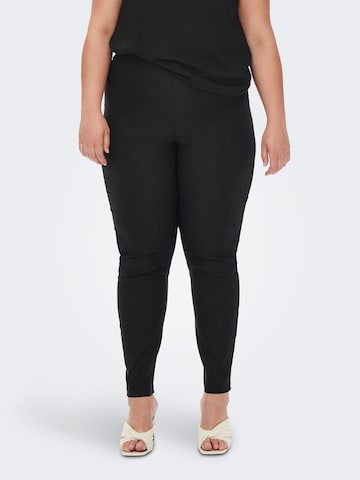 ONLY Carmakoma - Skinny Calças em preto: frente