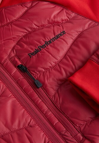 Veste d’hiver 'Helium Down' PEAK PERFORMANCE en rouge