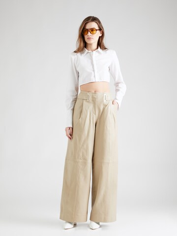 REMAIN Wide Leg Housut värissä beige