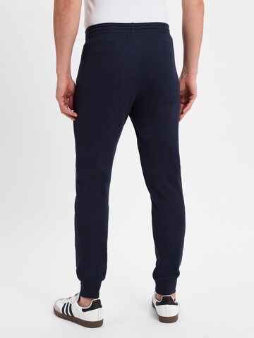 Champion Authentic Athletic Apparel Slimfit Hose in Blau