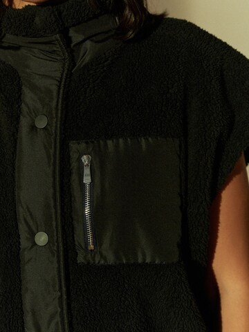 Gilet Next en noir
