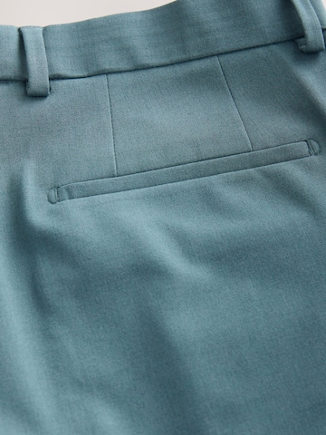 Slimfit Pantaloni chino 'Motionflex' di Next in blu