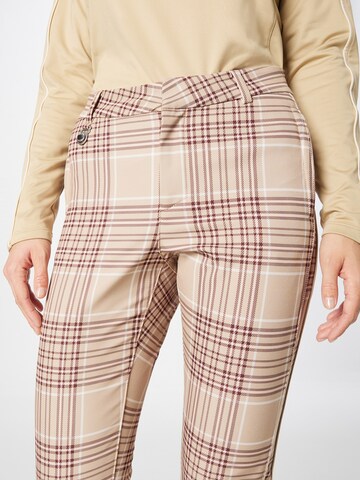 Röhnisch Normalny krój Spodnie sportowe 'Lexi' w kolorze beżowy