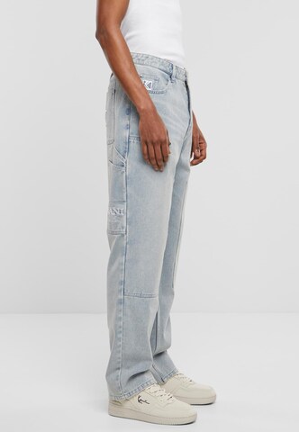 regular Jeans 'Carpenter' di Karl Kani in blu